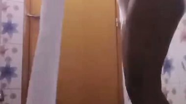 Bhabhi in bathroom baths and fingers cunt in horny mood