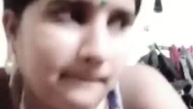 Naughty Desi bhabhi shows tits and fingers her XXX twat on camera