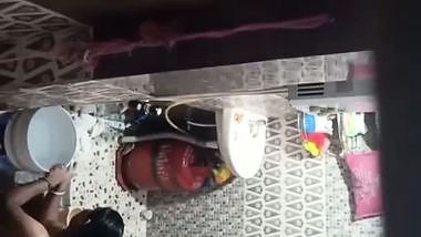 Neighbor aunty taking bath caught by voyeur