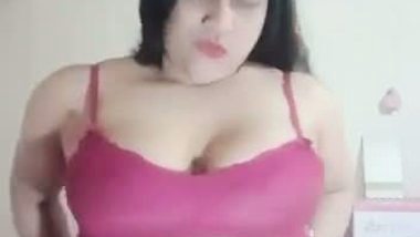Big boob nude girl shows her butt and squeezes her boobs