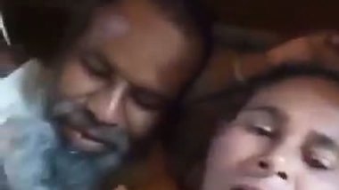An old man enjoys the boob sucking of a desi lady