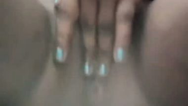 Village girl strips clothes and fingers her pussy heavily